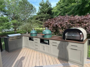 Outdoor kitchen with Challenger grill and accessories.